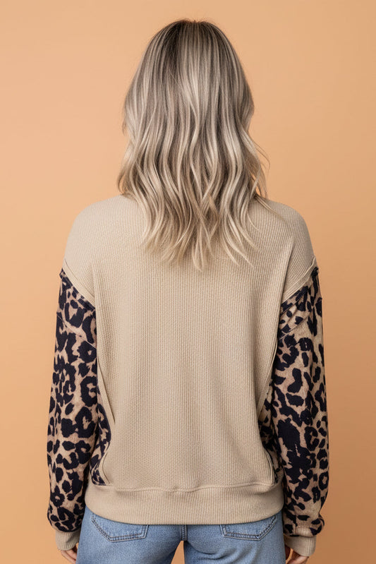 Gray Morn Leopard Waffle Knit Split Hem Sweater with leopard print, waffle texture, ribbed trim, and a flattering split hem, boutique fashion