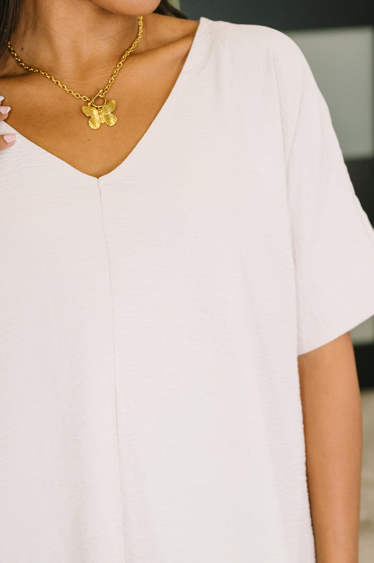 Counter Part Crinkle Woven V-Neck Top in Sand Beige boutique top at Mollie Mae Boutique