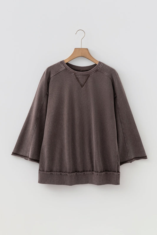 Dark Brown Mineral Wash Reverse Seam Top with a lived-in mineral wash, reverse seams, and bracelet-length sleeves, boutique fashion