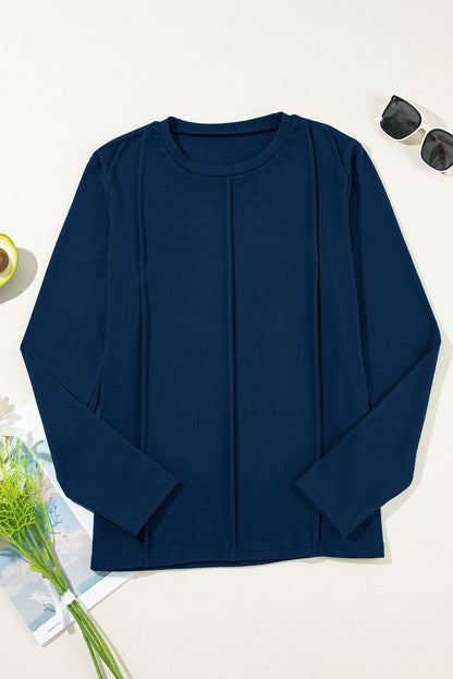 Navy Blue navy blue exposed seam crew neck long sleeve top with boutique fashion styling