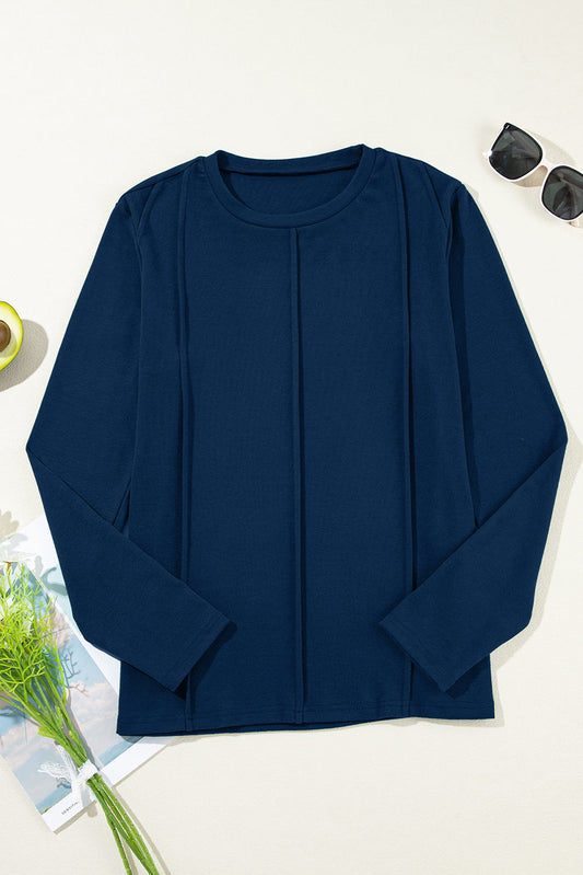 Navy Blue navy blue exposed seam crew neck long sleeve top with boutique fashion styling