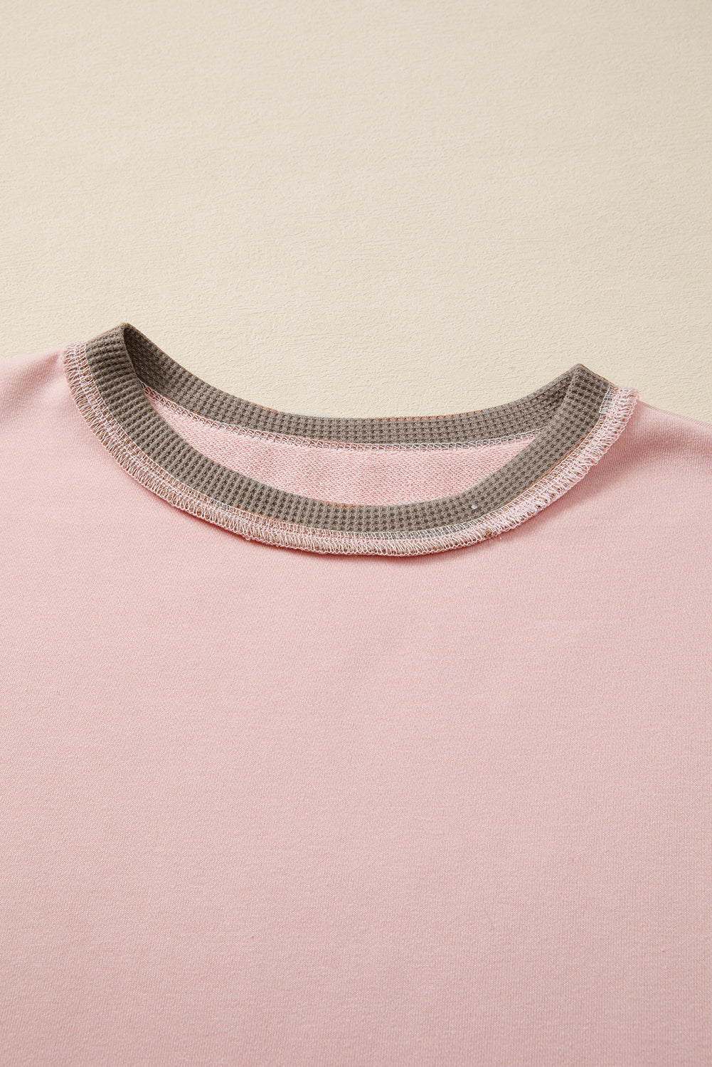 Light Pink colorblock waffle knit reverse seam oversized sweatshirt with boutique fashion styling