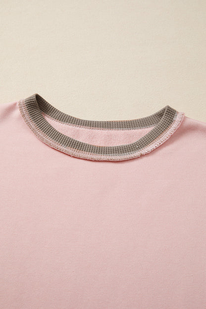 Light Pink colorblock waffle knit reverse seam oversized sweatshirt with boutique fashion styling