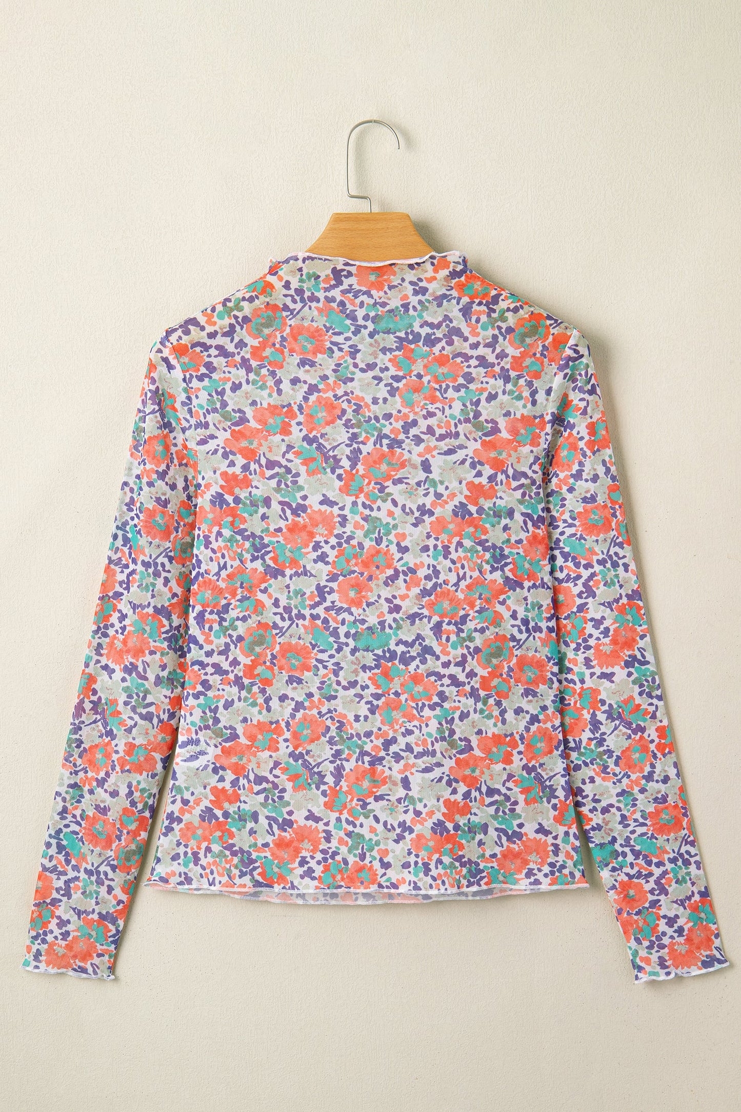 Blue Floral Mesh Long Sleeve Mock Neck Top with floral detail and mesh texture women's boutique fashion