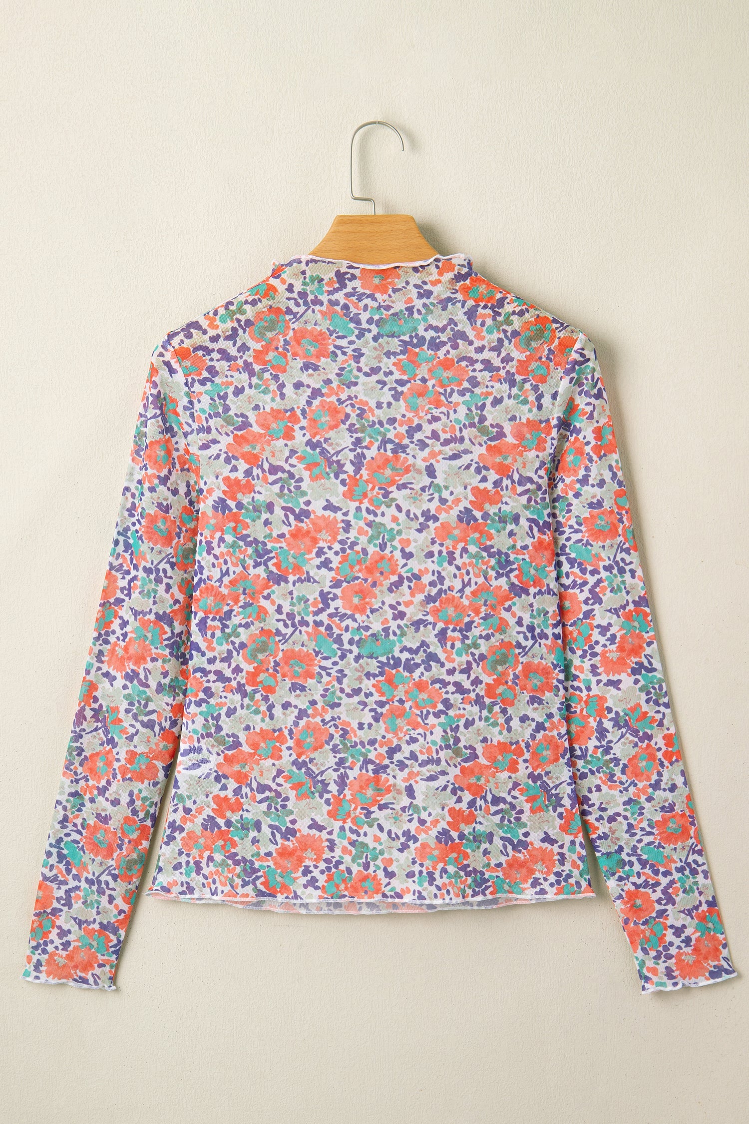 Blue Floral Mesh Long Sleeve Mock Neck Top with floral detail and mesh texture women's boutique fashion