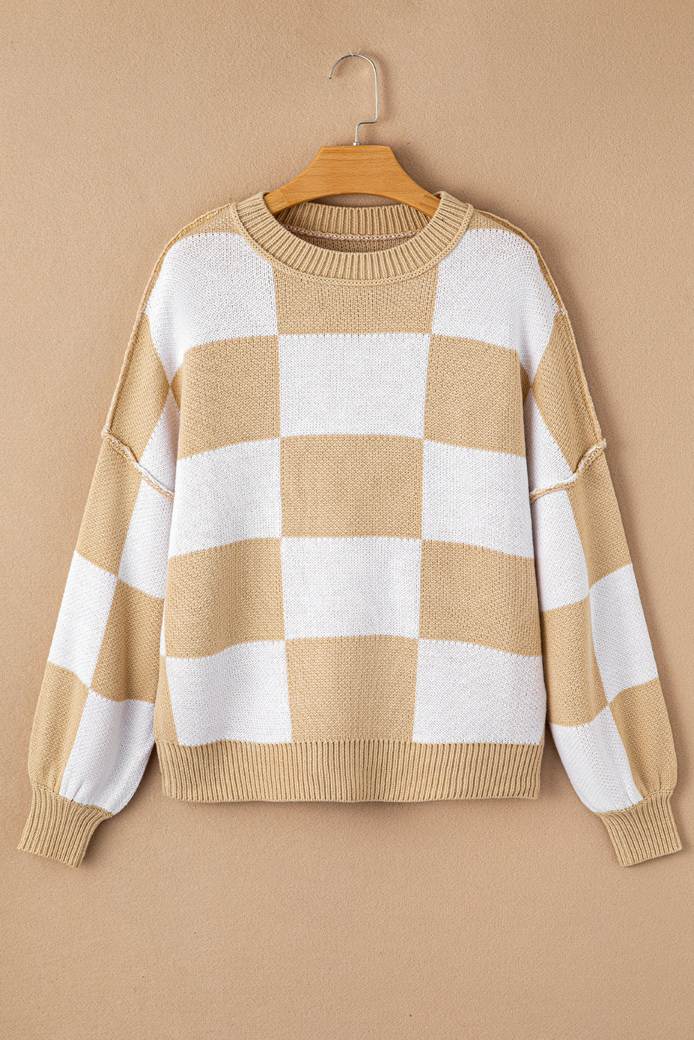 Khaki checkered exposed seam drop shoulder sweater with checkered knit, exposed seam details and relaxed drop shoulders, women’s boutique fashion