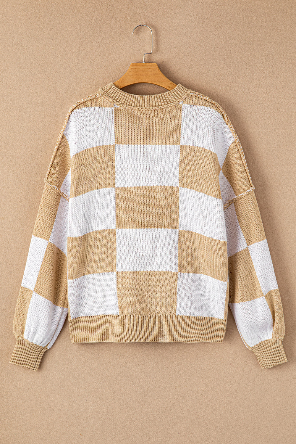 Khaki checkered exposed seam drop shoulder sweater with checkered knit, exposed seam details and relaxed drop shoulders, women’s boutique fashion