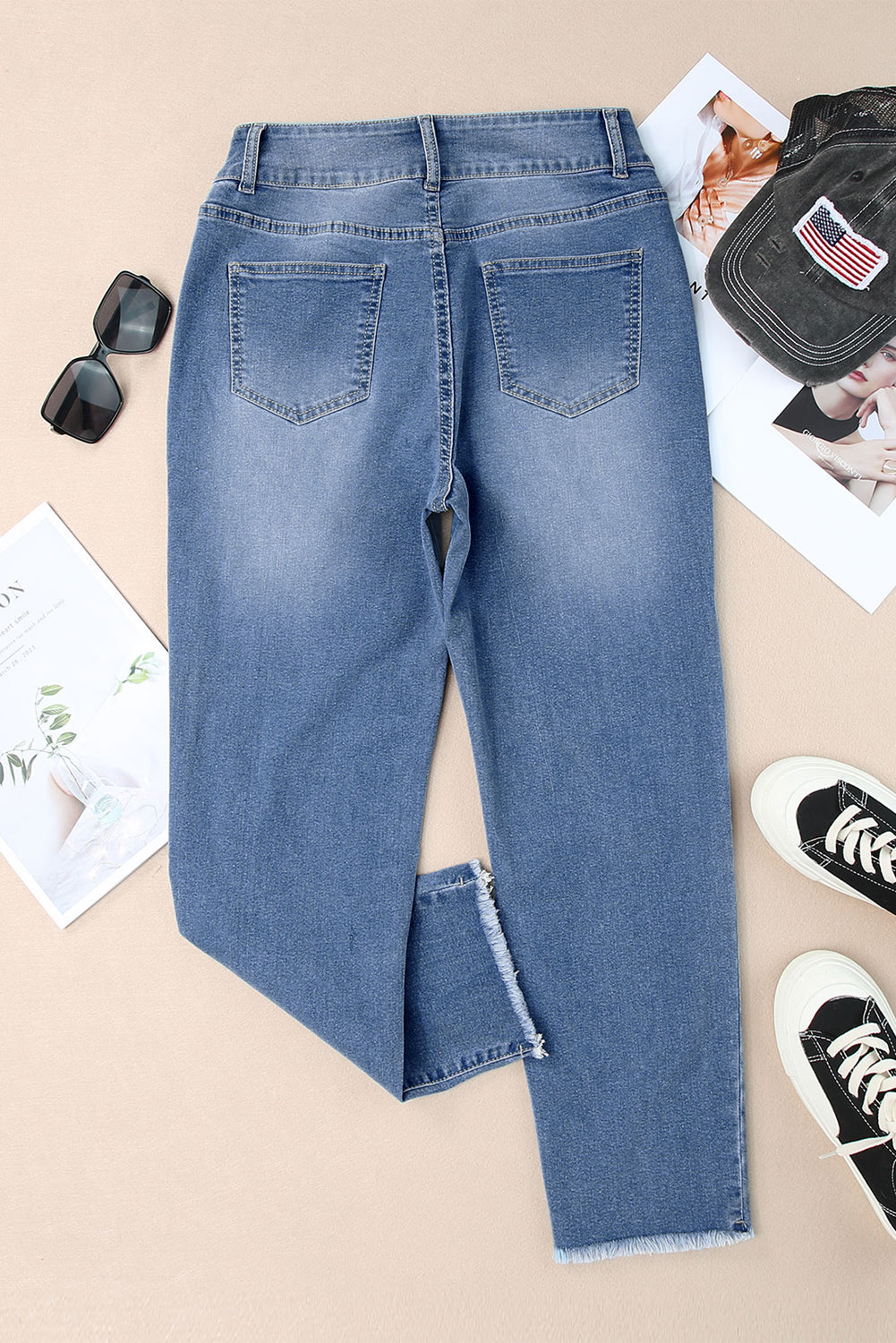 sky blue buttoned high waist raw hem skinny jeans for women