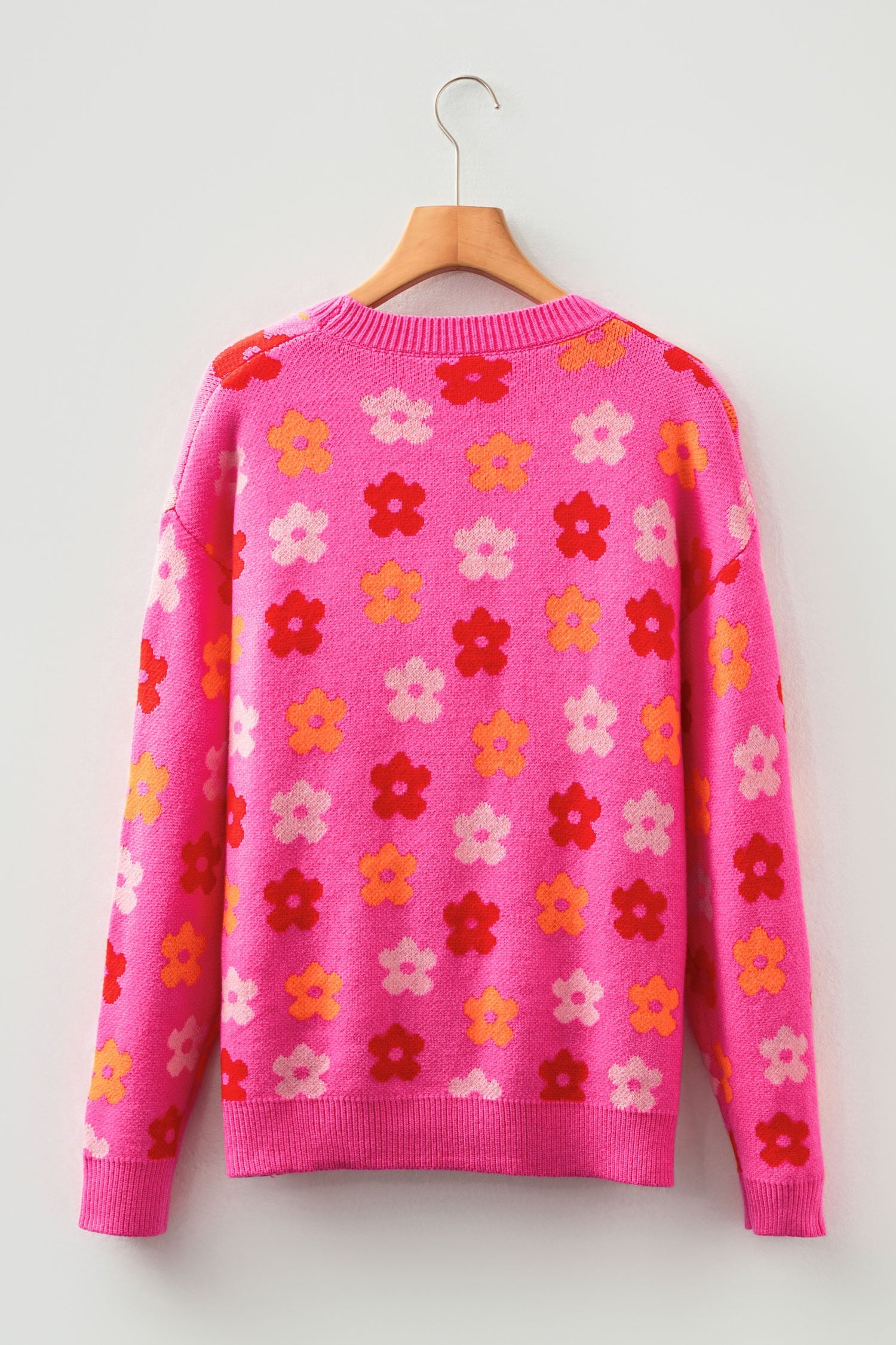 Rose floral drop shoulder ribbed trim sweater with allover floral pattern, drop shoulders and ribbed trim, women’s boutique fashion