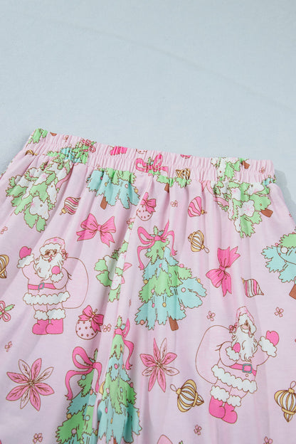 pink Christmas pajama set with ruffle collar, long sleeves and festive print boutique loungewear