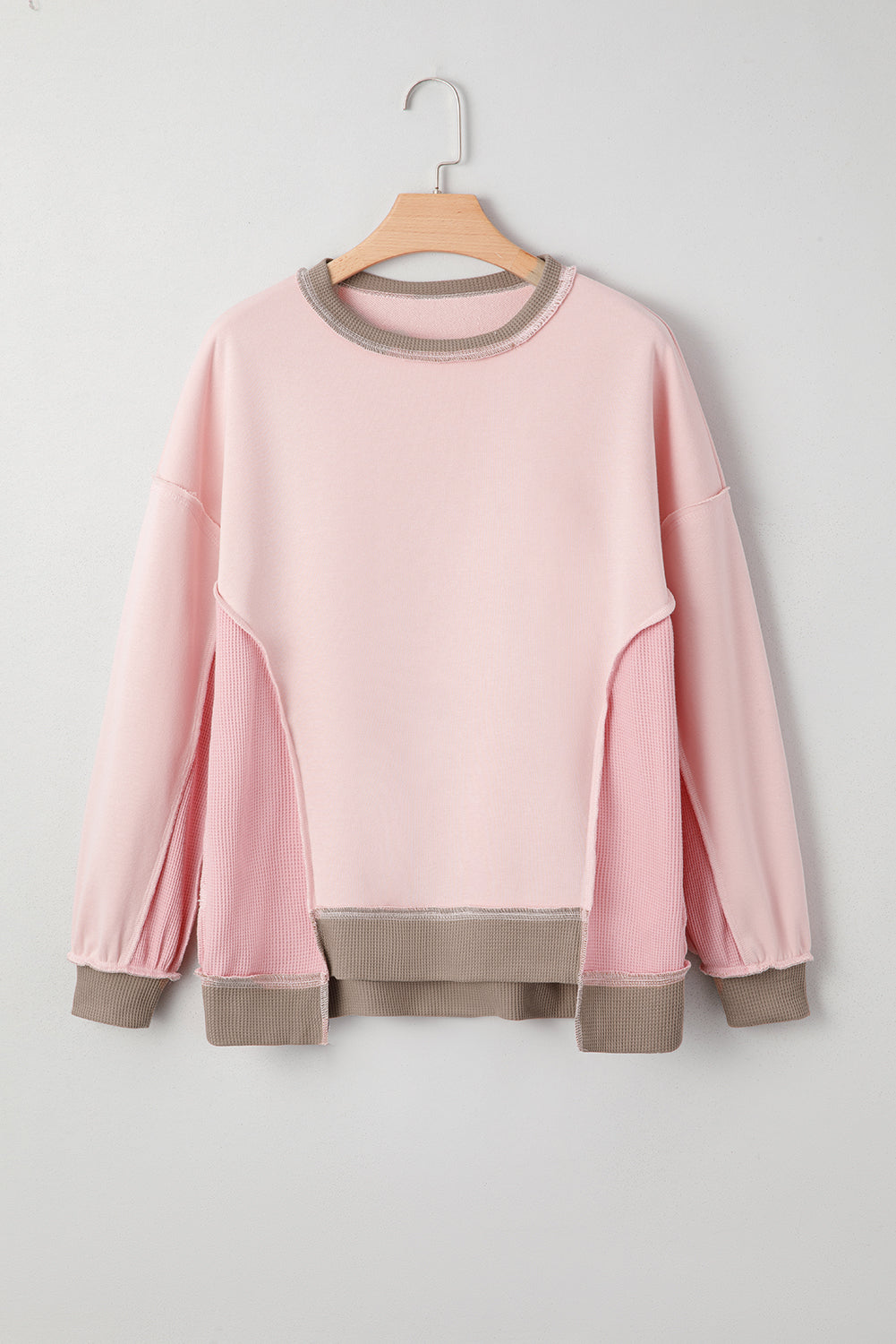 Light Pink colorblock waffle knit reverse seam oversized sweatshirt with boutique fashion styling