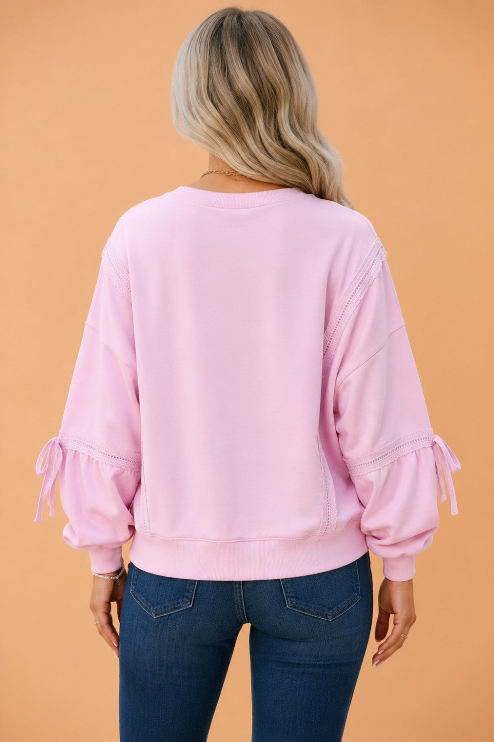 Pink Lace Trim Raw Seam Sweatshirt with feminine lace trim, raw seams, and a relaxed cozy fit, boutique fashion
