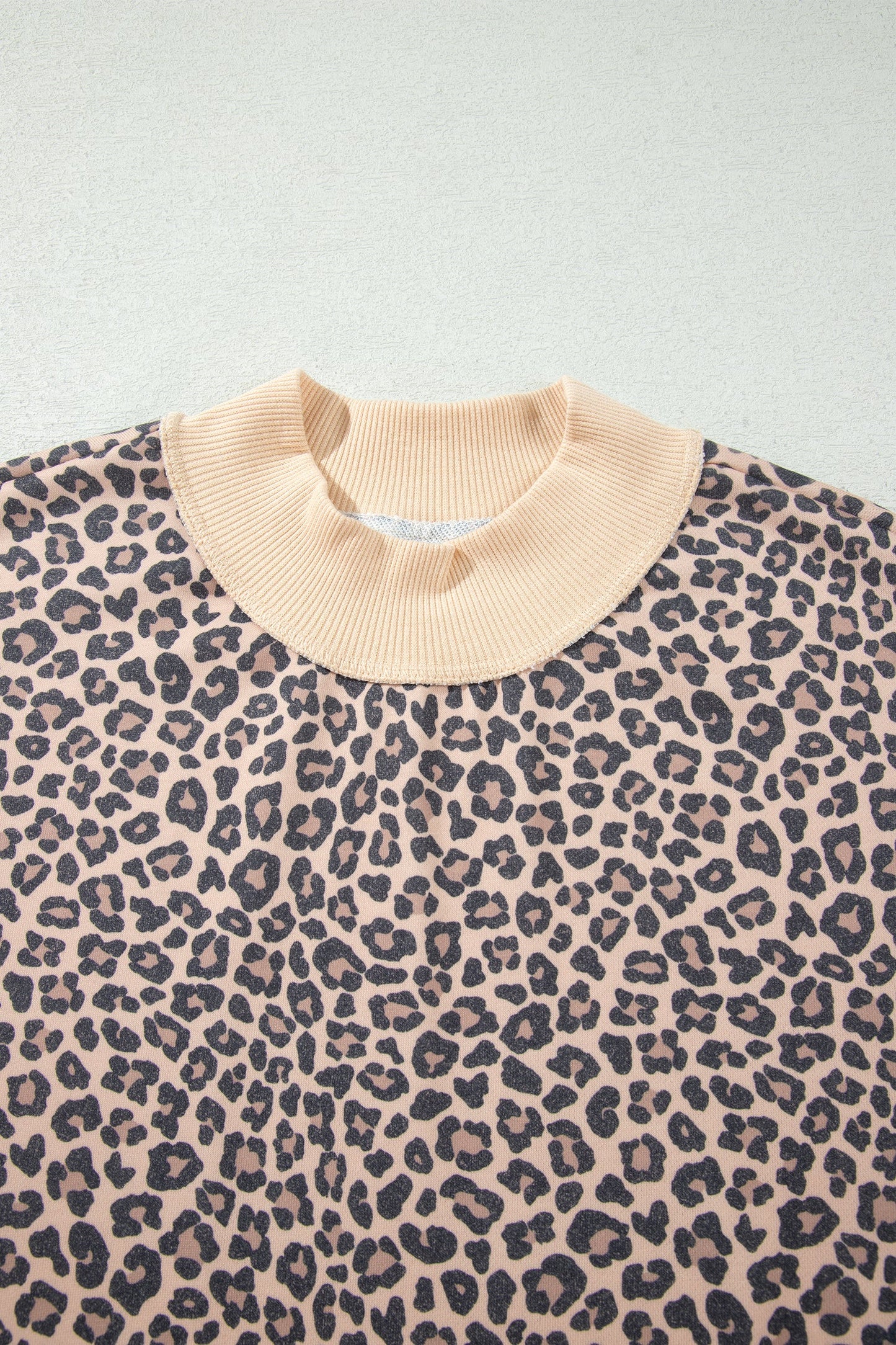 multicolor leopard print high neck ribbed trim sweatshirt with leopard print, high neckline and ribbed trim, women’s boutique fashion