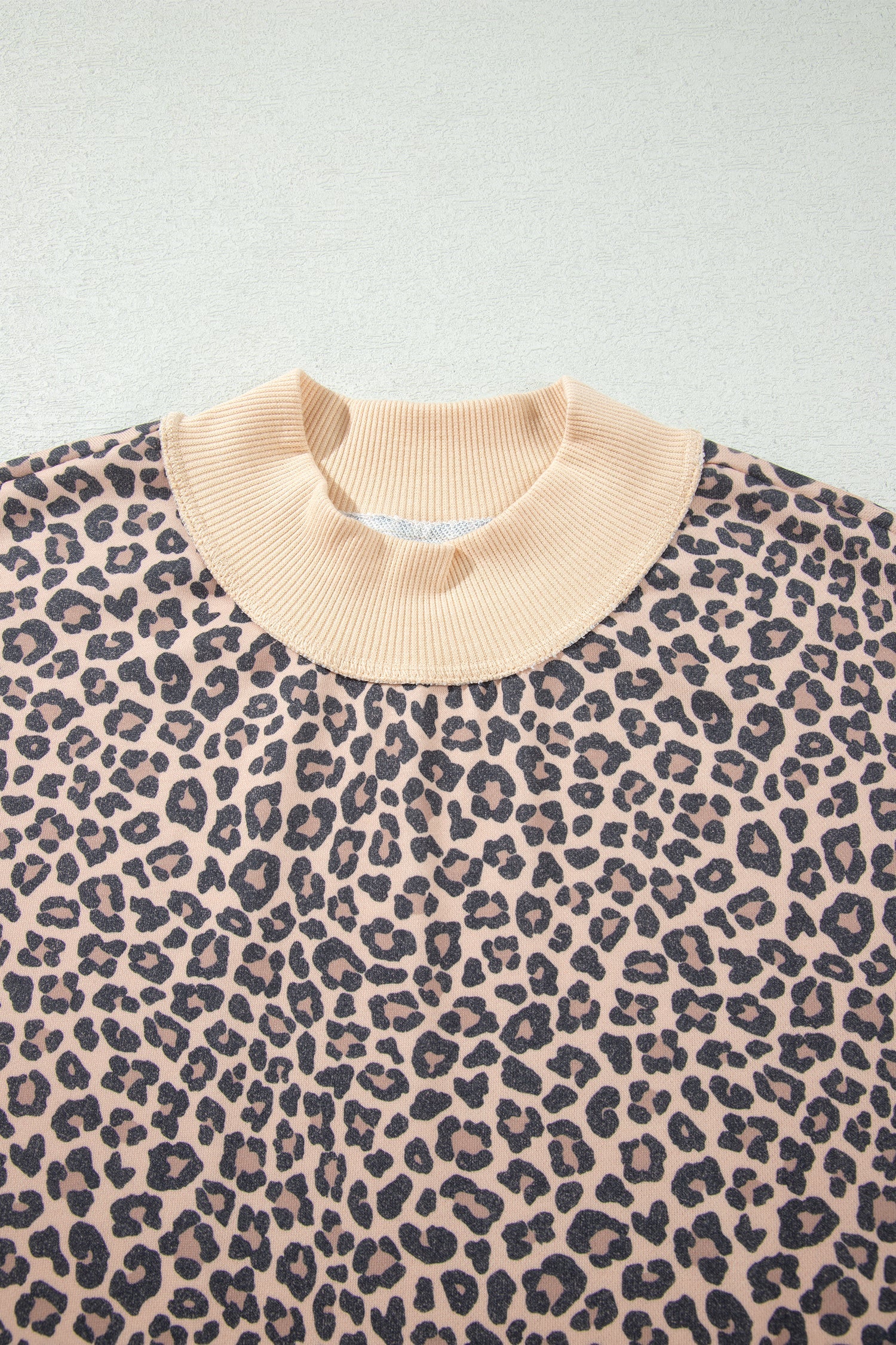 multicolor leopard print high neck ribbed trim sweatshirt with leopard print, high neckline and ribbed trim, women’s boutique fashion