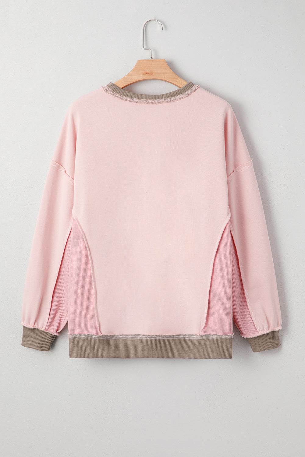 Light Pink colorblock waffle knit reverse seam oversized sweatshirt with boutique fashion styling
