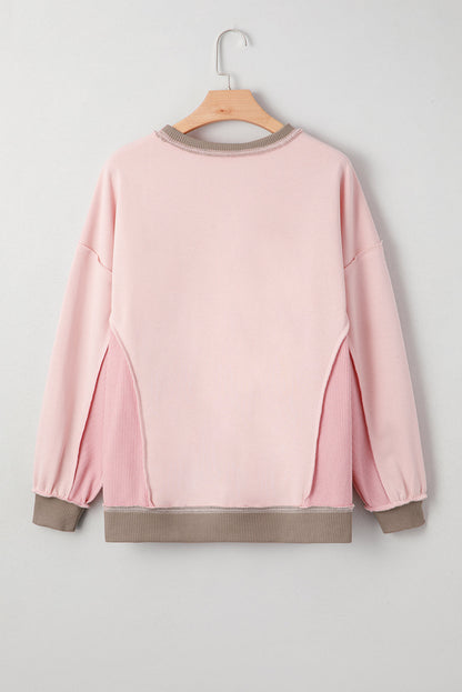 Light Pink colorblock waffle knit reverse seam oversized sweatshirt with boutique fashion styling