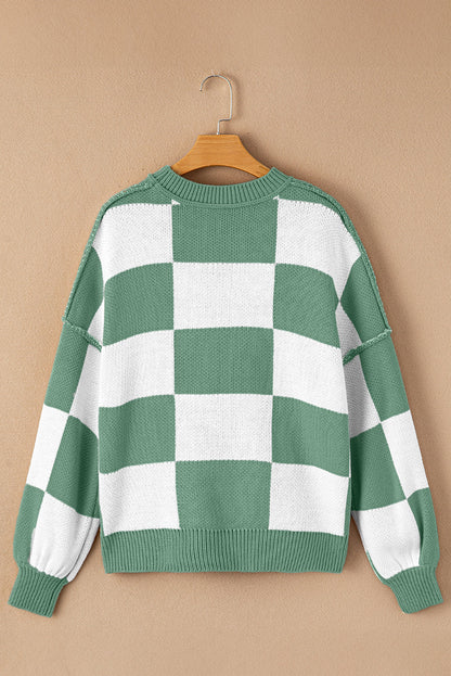 Green checkered exposed seam drop shoulder sweater with checkered knit, exposed seam details and relaxed drop shoulders, women’s boutique fashion