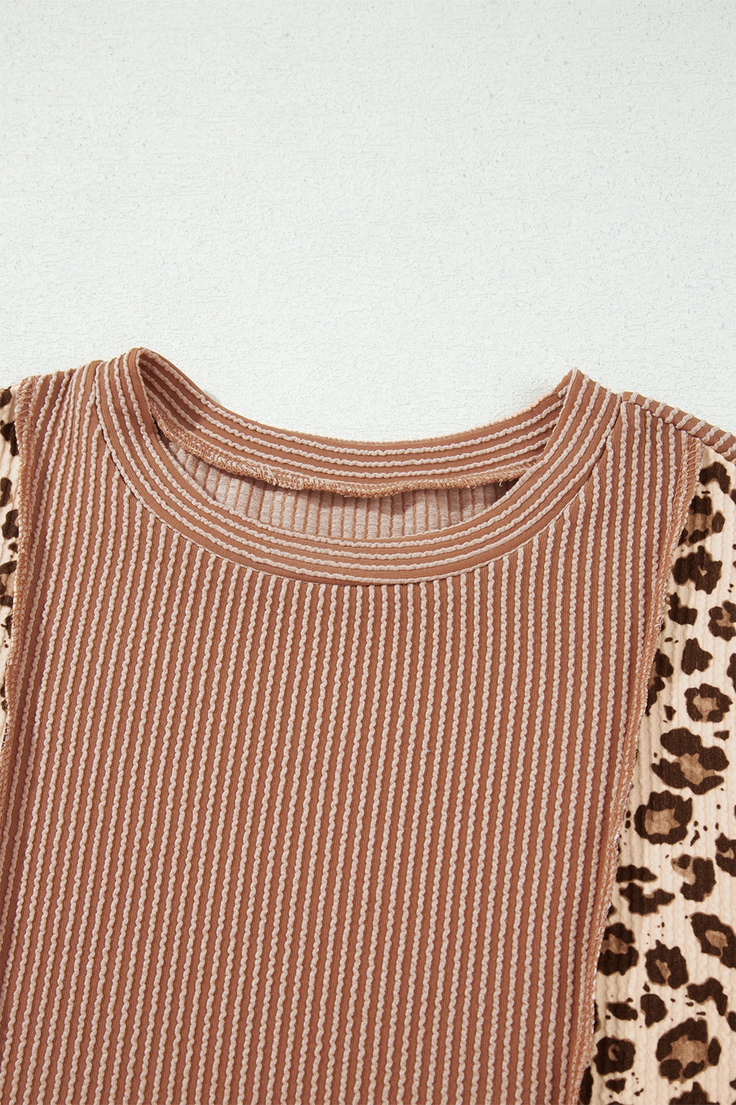 Dune leopard colorblock corded knit long sleeve top with reverse seams and relaxed fit