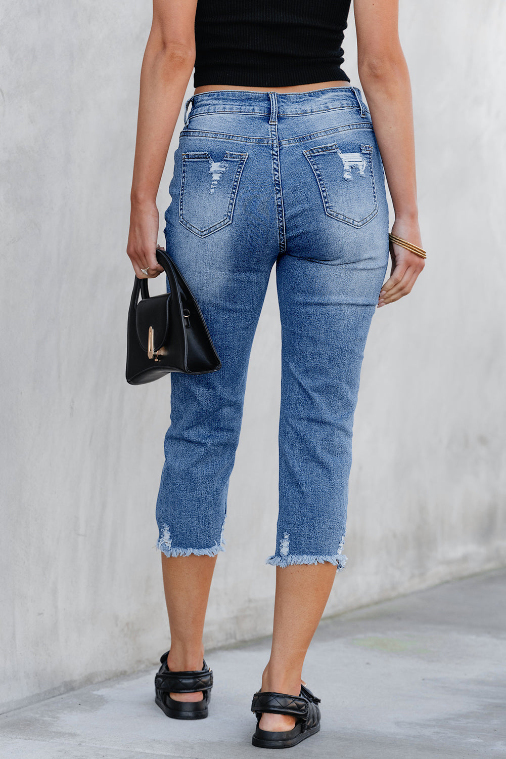Georgia distressed skinny capri jeans in sky blue washed denim for women