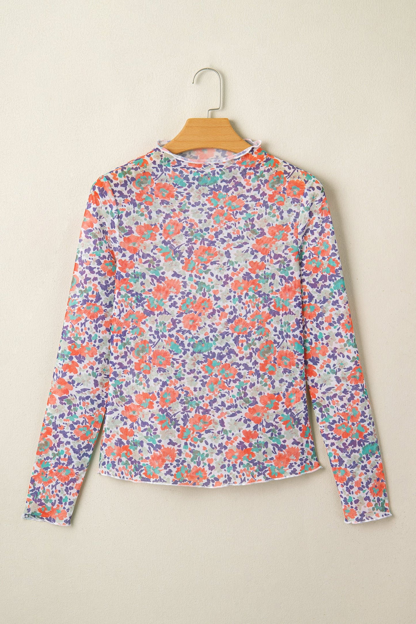 Blue Floral Mesh Long Sleeve Mock Neck Top with floral detail and mesh texture women's boutique fashion
