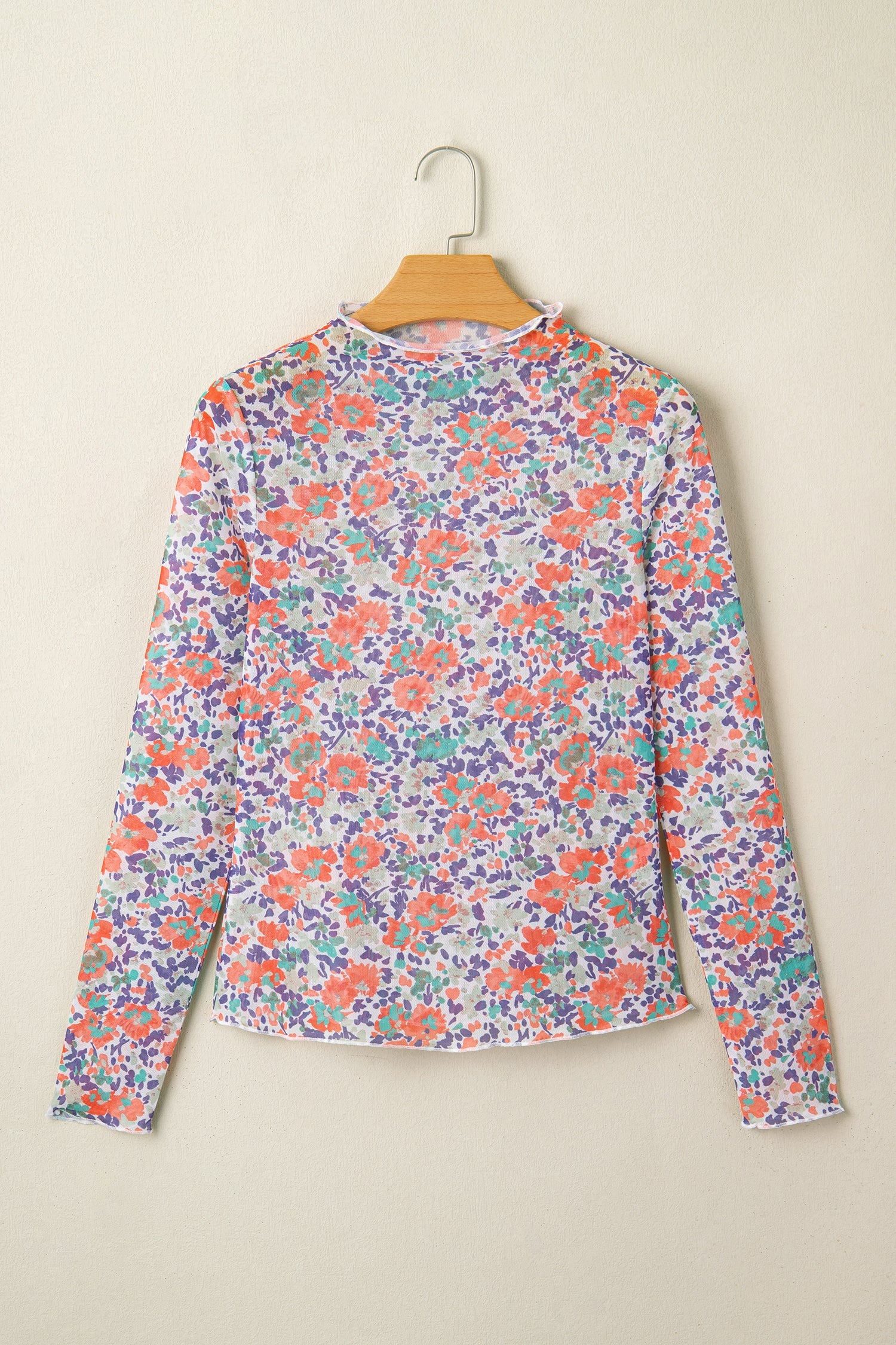 Blue Floral Mesh Long Sleeve Mock Neck Top with floral detail and mesh texture women's boutique fashion