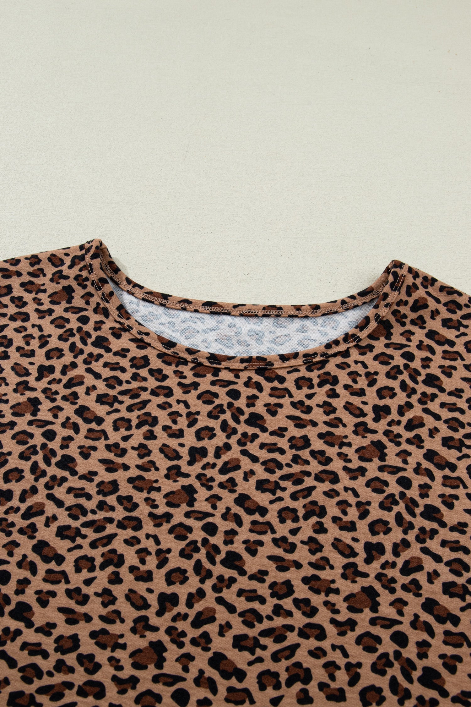 plus size brown leopard short sleeve top and pleated pants set