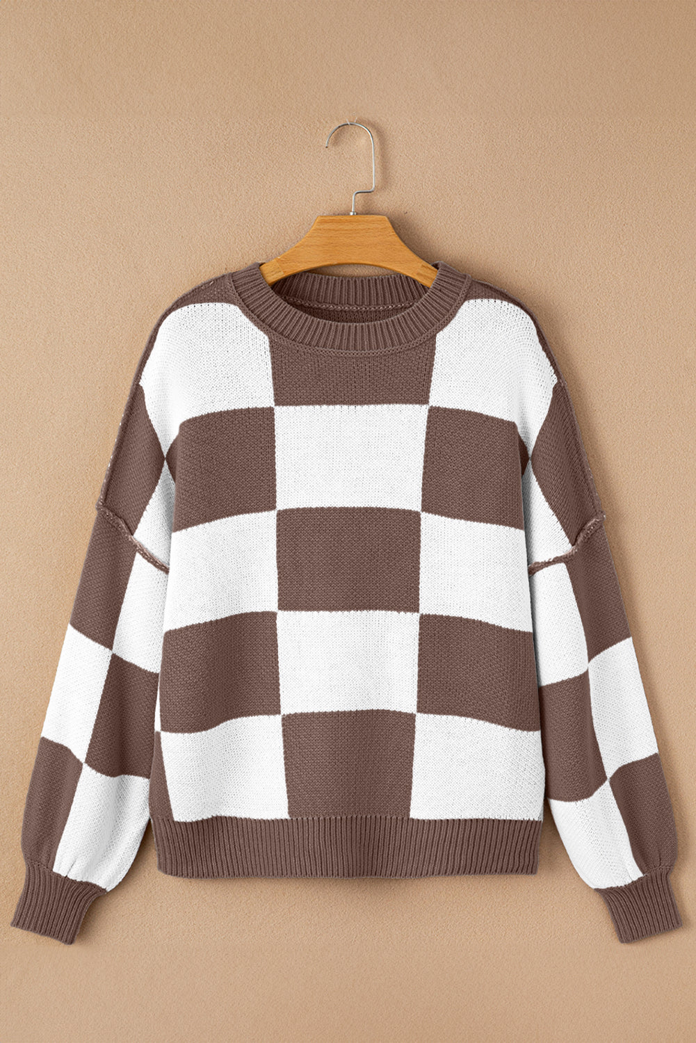 Green checkered exposed seam drop shoulder sweater with checkered knit, exposed seam details and relaxed drop shoulders, women’s boutique fashion