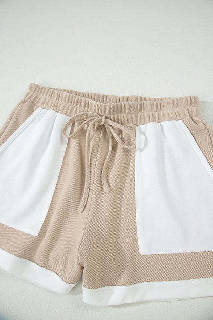 Beige colorblock oversized tee and shorts set with raw edge seams, relaxed fit, and casual boutique loungewear style