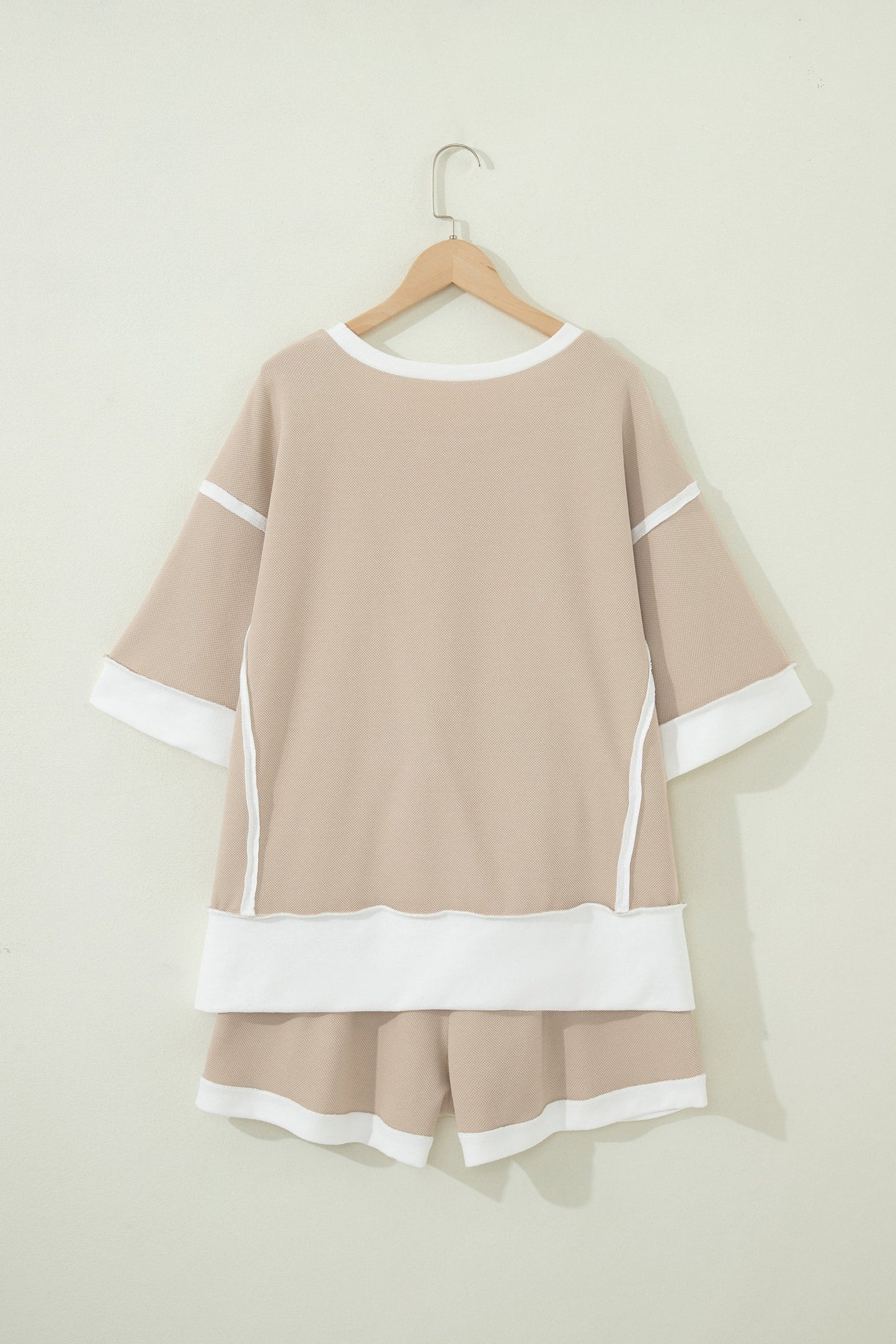 Beige colorblock oversized tee and shorts set with raw edge seams, relaxed fit, and casual boutique loungewear style