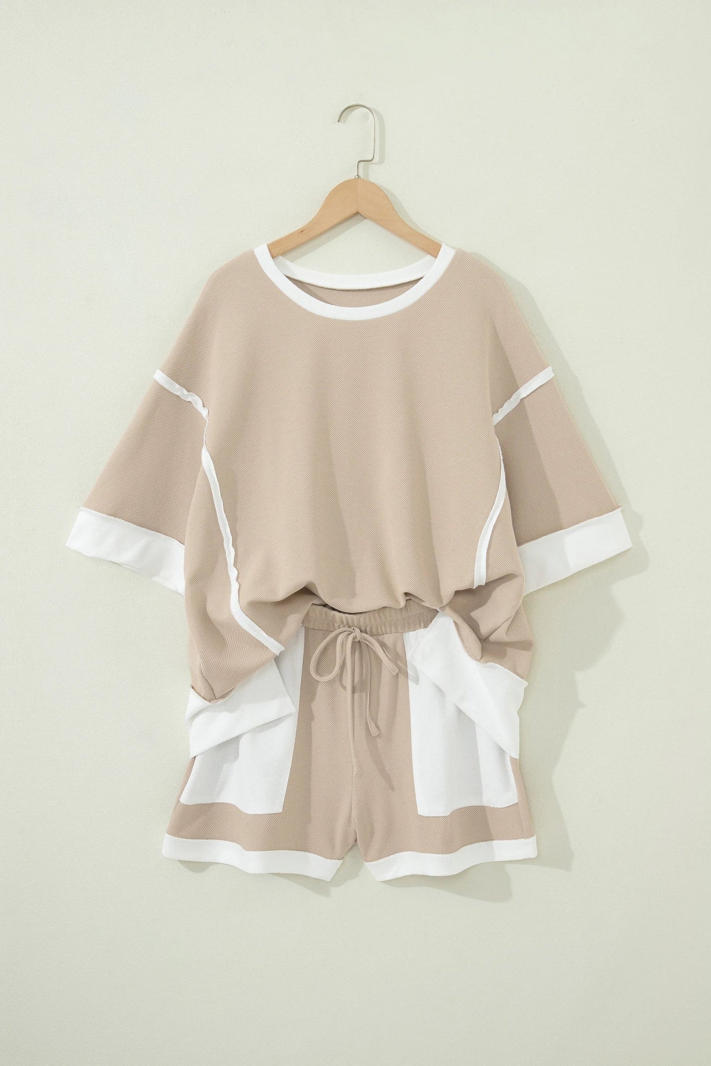 Beige colorblock oversized tee and shorts set with raw edge seams, relaxed fit, and casual boutique loungewear style