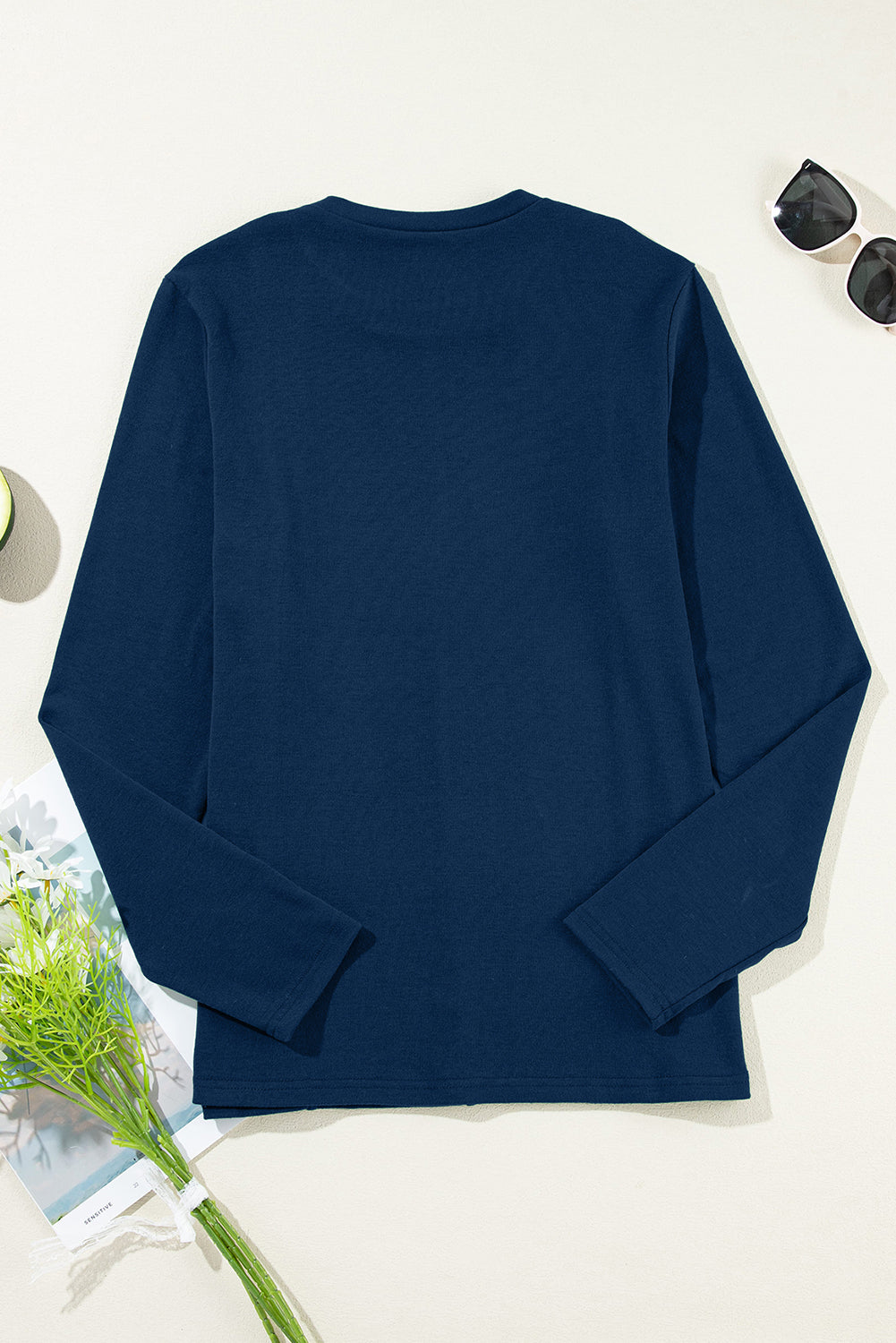 Navy Blue navy blue exposed seam crew neck long sleeve top with boutique fashion styling