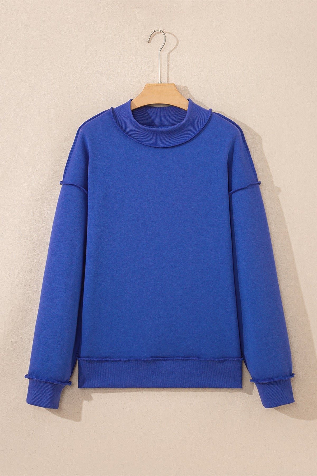 Black reversible mock neck drop shoulder oversized sweatshirt with relaxed boutique styling