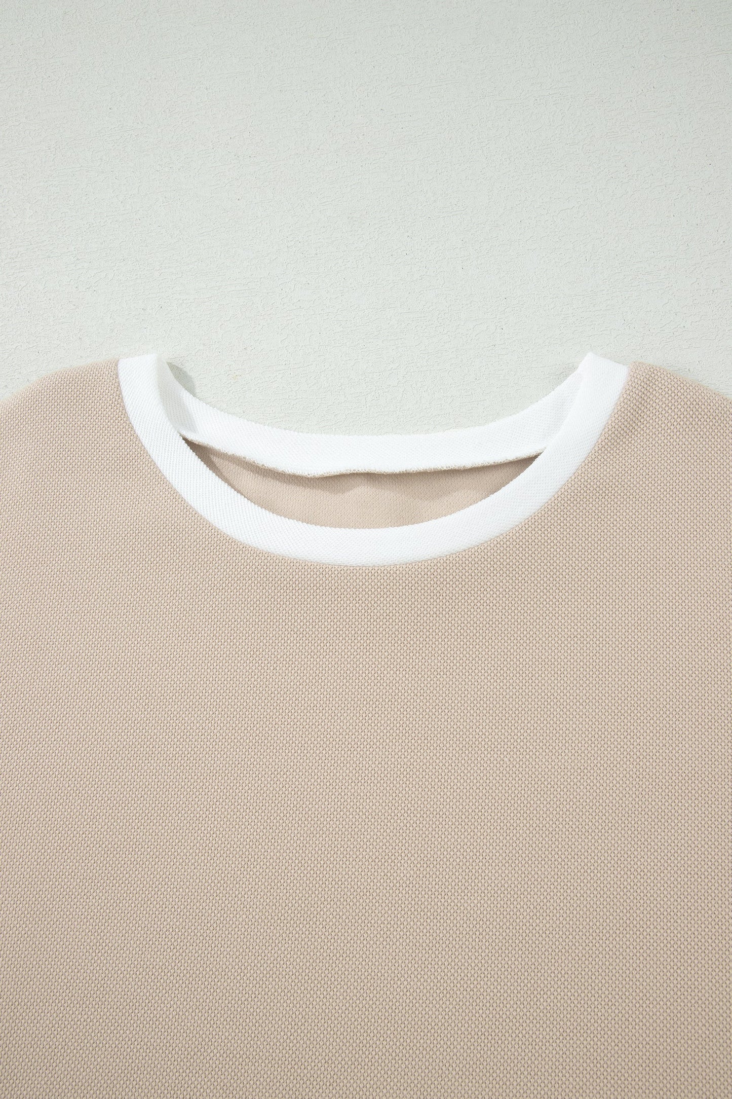 Beige colorblock oversized tee and shorts set with raw edge seams, relaxed fit, and casual boutique loungewear style