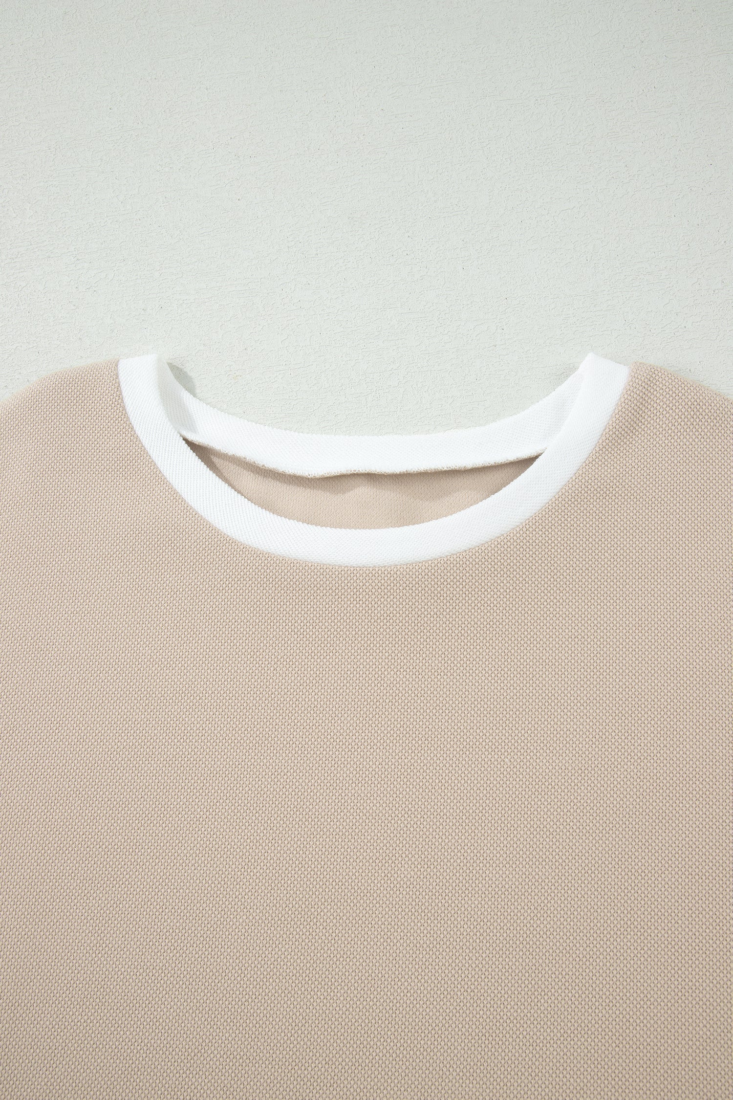 Beige colorblock oversized tee and shorts set with raw edge seams, relaxed fit, and casual boutique loungewear style