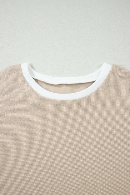 Beige colorblock oversized tee and shorts set with raw edge seams, relaxed fit, and casual boutique loungewear style