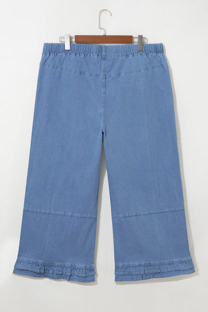Light blue plus size wide leg jeans with ruffle hem and relaxed fit, women’s boutique denim style