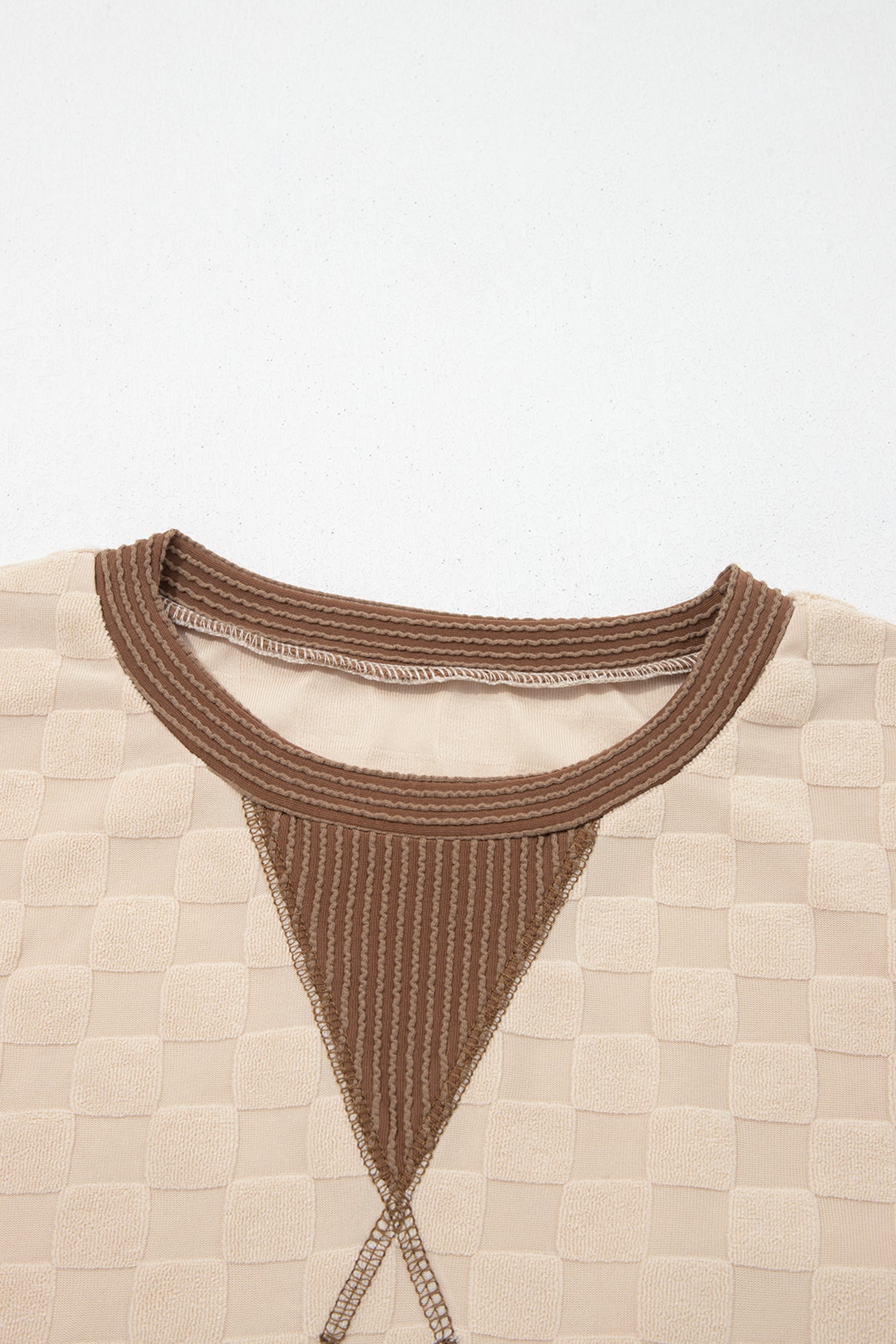 Parchment parchment checker corded knit contrast trim top with boutique fashion styling
