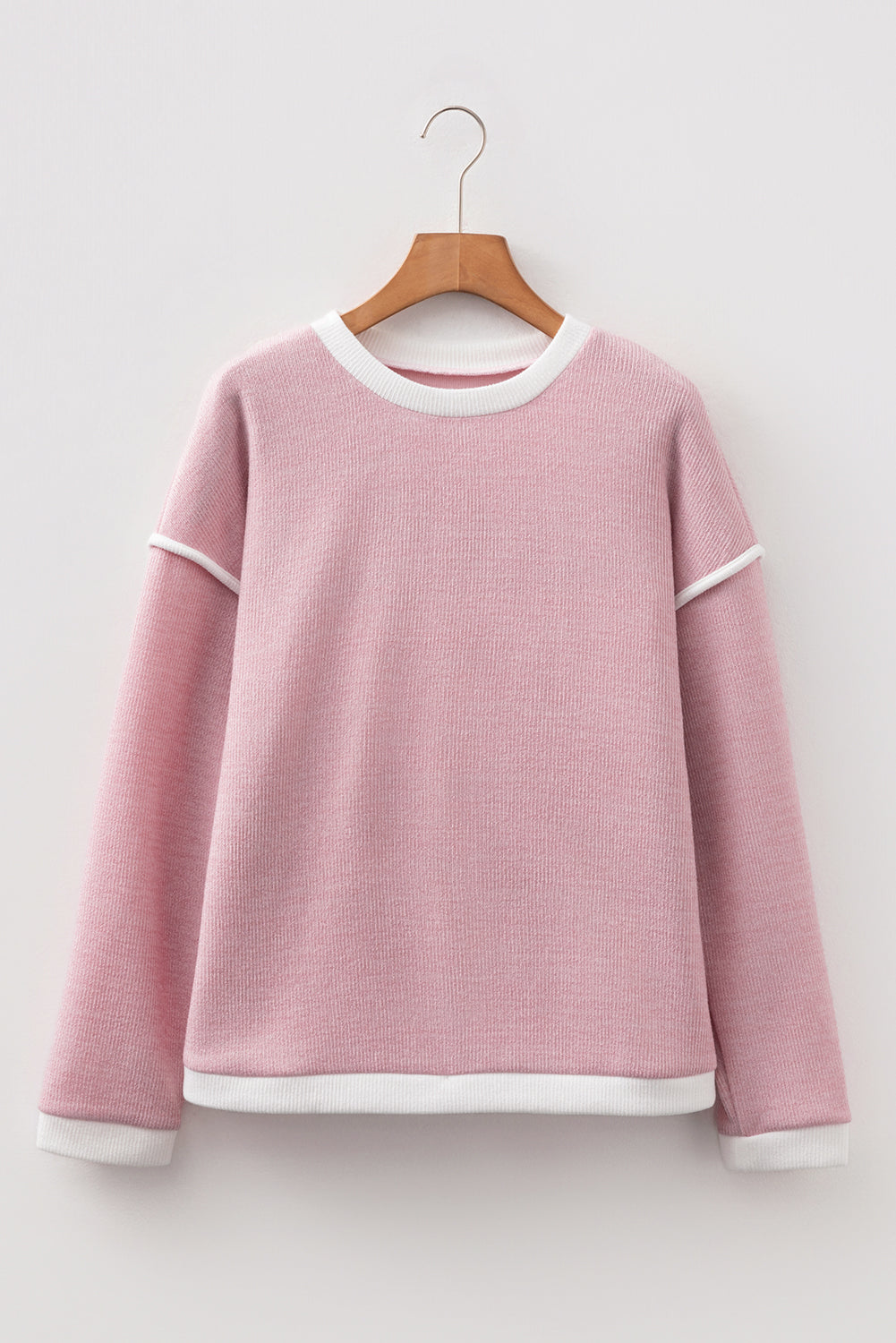 Four Leaf Clover contrast trim drop shoulder long sleeve knit top with boutique fashion styling