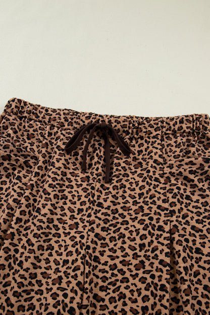 plus size brown leopard short sleeve top and pleated pants set