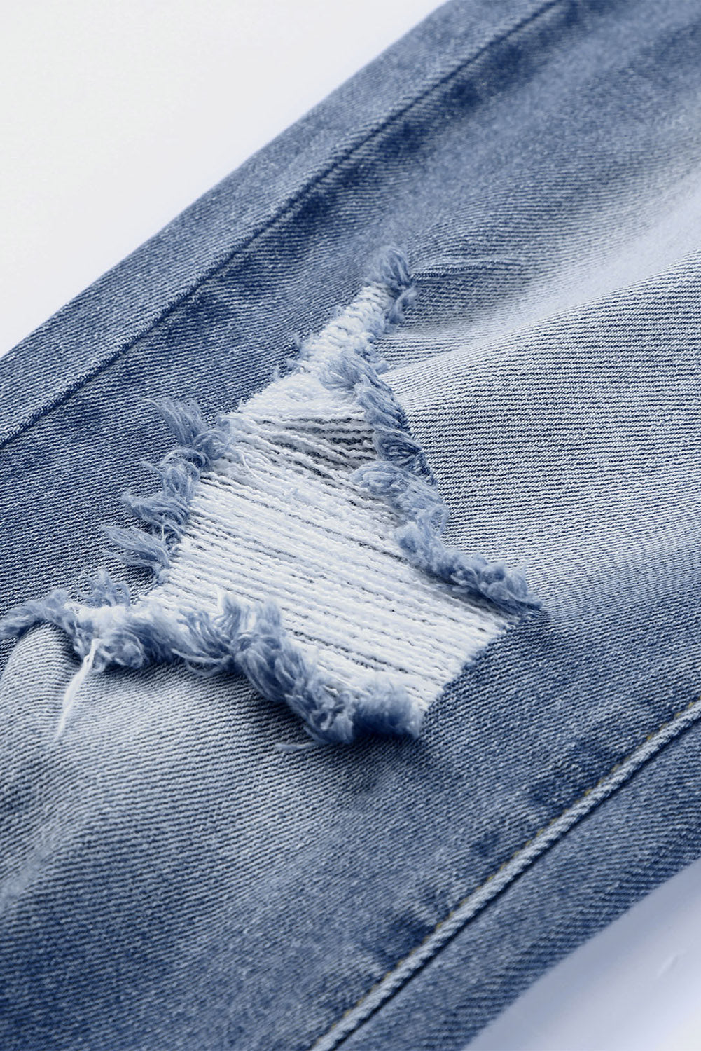 Georgia distressed skinny capri jeans in sky blue washed denim for women