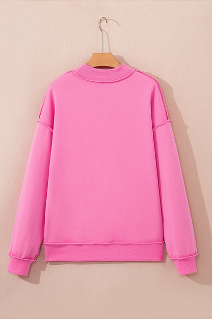 Bright pink plus size reversible mock neck sweatshirt with exposed seams and relaxed drop shoulders, boutique casual top