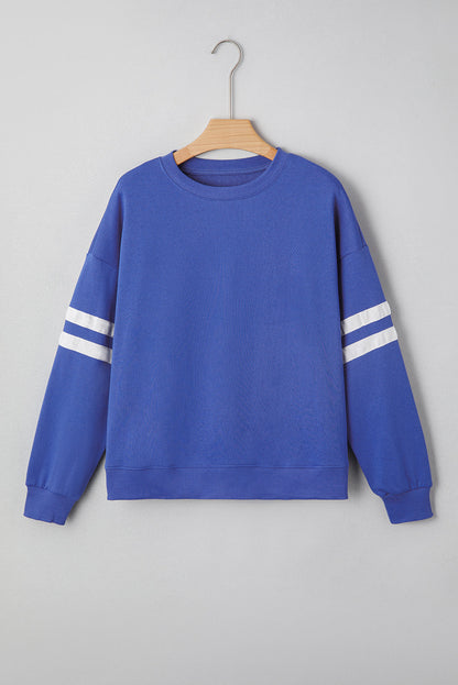 multiple colors Varsity Stripe Oversized Drop Shoulder Sweatshirt with varsity stripe details and an oversized drop-shoulder fit, boutique fashion