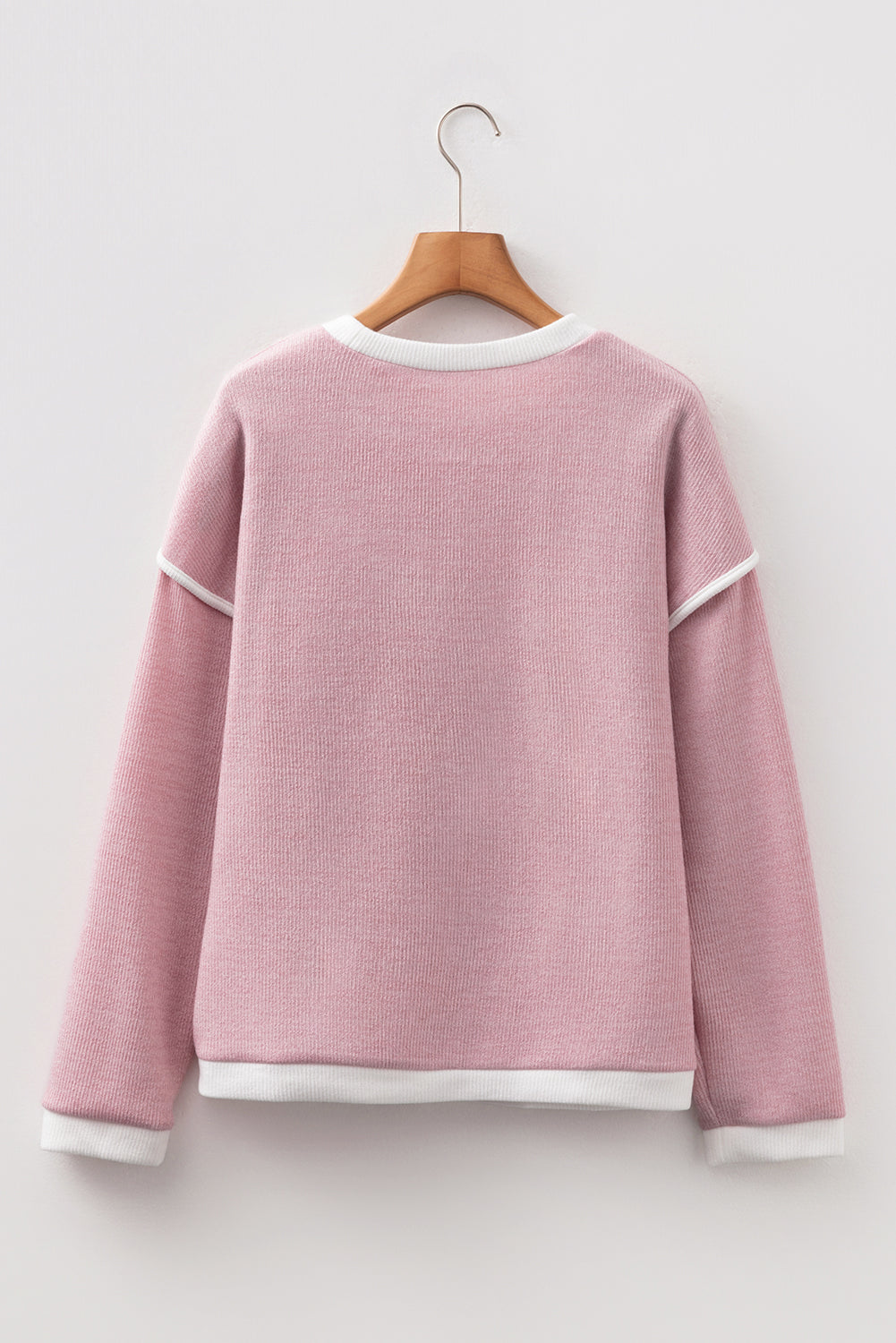 Four Leaf Clover contrast trim drop shoulder long sleeve knit top with boutique fashion styling