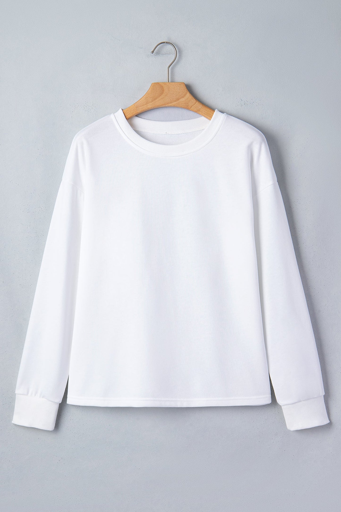 White Solid Drop Shoulder Long Sleeve Top featuring boutique-style details and relaxed everyday fit