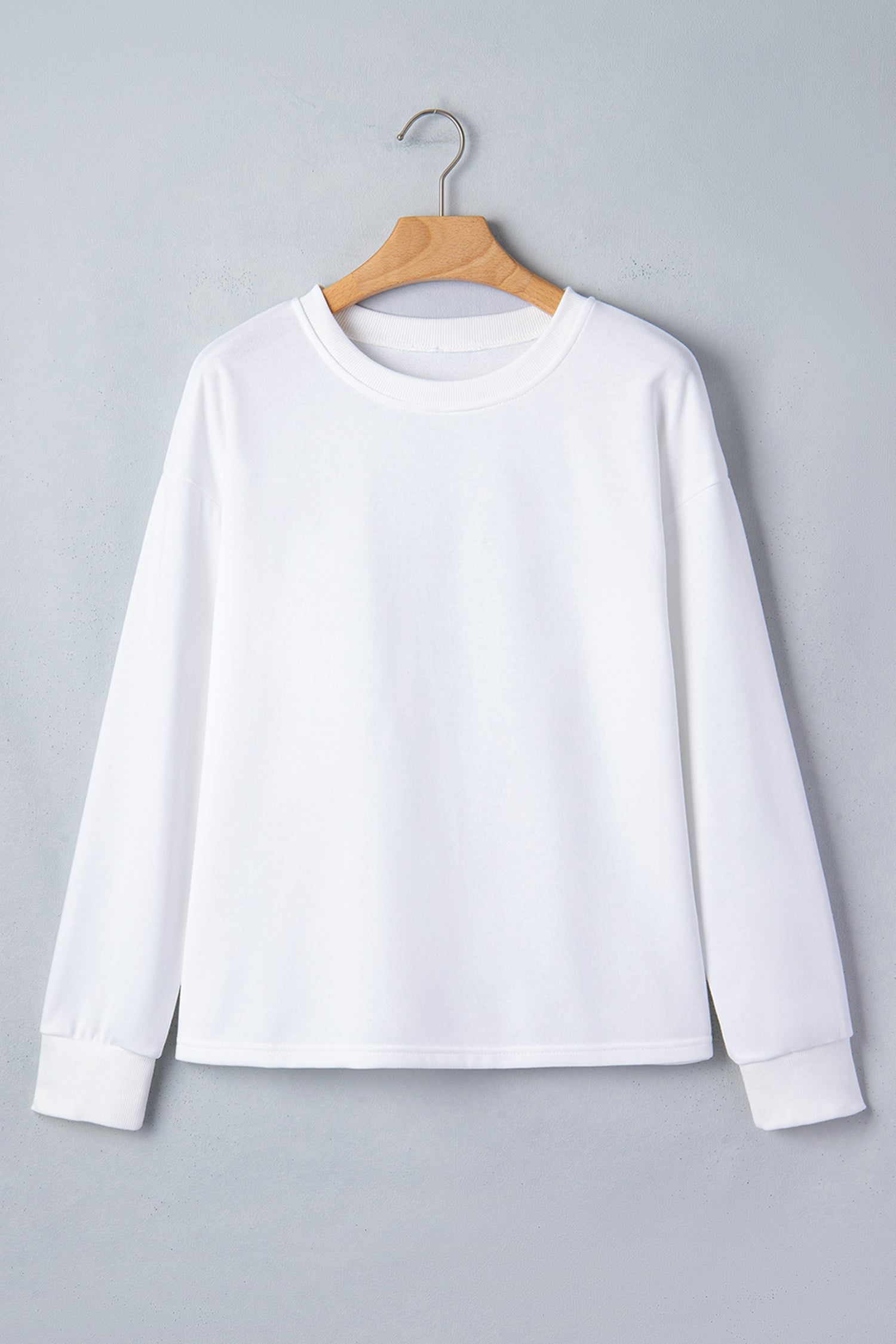 White Solid Drop Shoulder Long Sleeve Top featuring boutique-style details and relaxed everyday fit