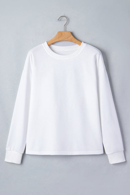 White Solid Drop Shoulder Long Sleeve Top featuring boutique-style details and relaxed everyday fit