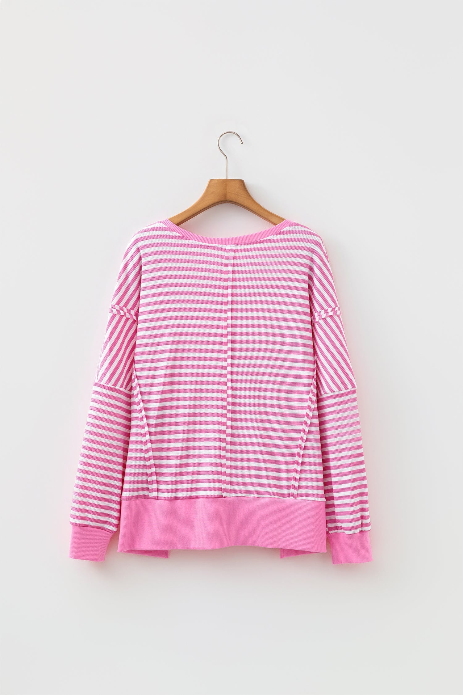Pink Stripe pink stripe textured knit split hem sweater with boutique fashion styling