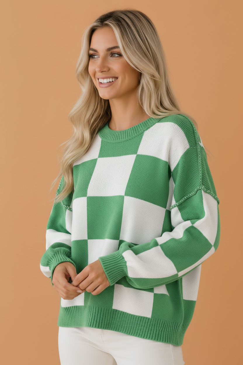 Green checkered exposed seam drop shoulder sweater with checkered knit, exposed seam details and relaxed drop shoulders, women’s boutique fashion