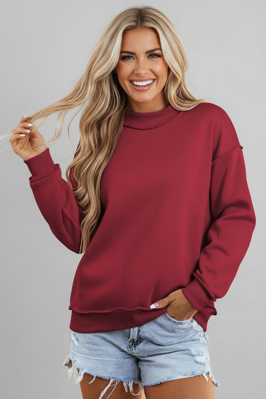 Red Solid Reversible Mock Neck Oversized Sweatshirt boutique fashion piece with stylish details and comfortable everyday wear