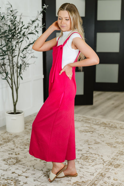 Suit Yourself Adjustable Strap Jumpsuit in Pink boutique dress from Mollie Mae Boutique
